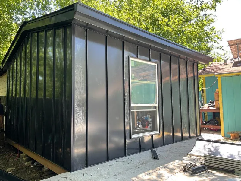 Black standing seam metal wall panels for Roof Inspection in Brea